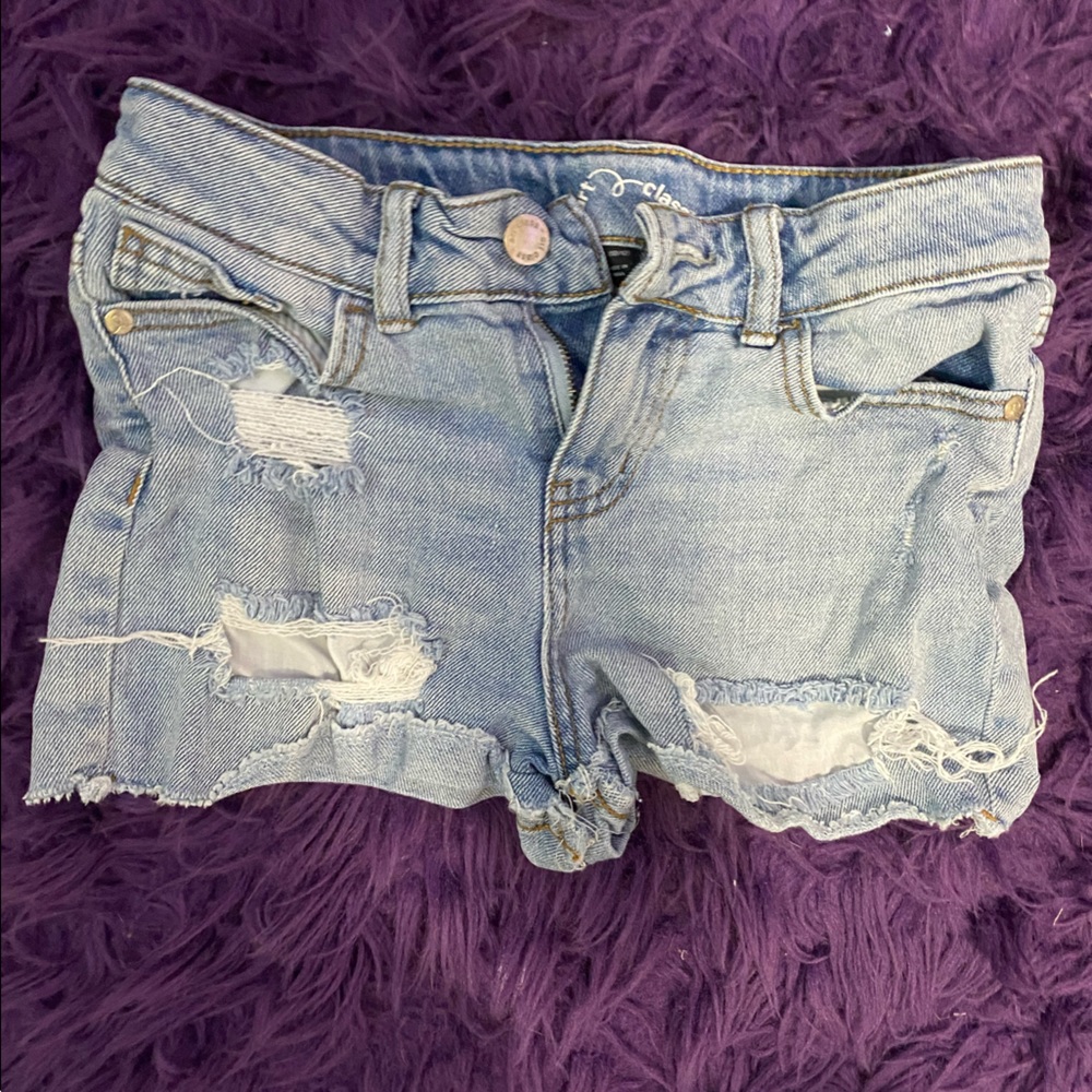 Ripped Jean shorts.